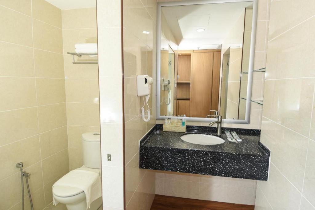 Koupelna v ubytování Hotel Holmes Gp