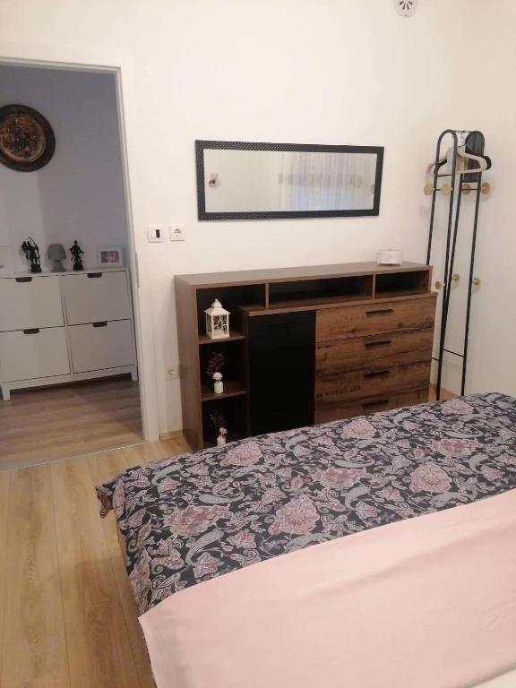 Postel nebo postele na pokoji v ubytování Apartments Hasanovic Rukavac
