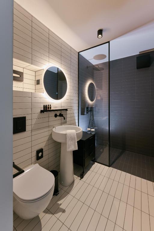 Koupelna v ubytování NEU RESIDENCES smart stay