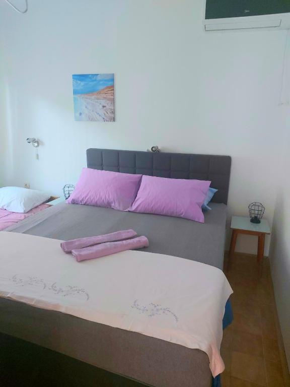 Postel nebo postele na pokoji v ubytování Apartman Arija-Pino
