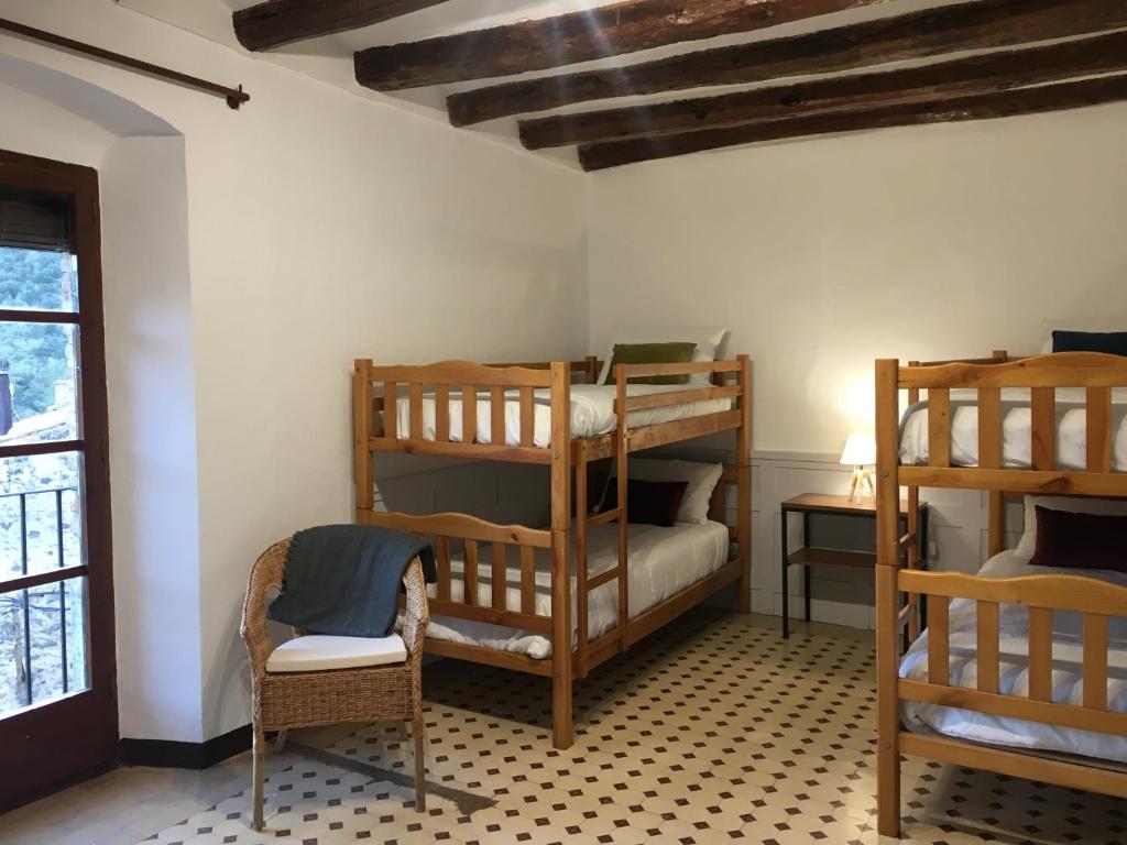 Postel nebo postele na pokoji v ubytování espai Abadia