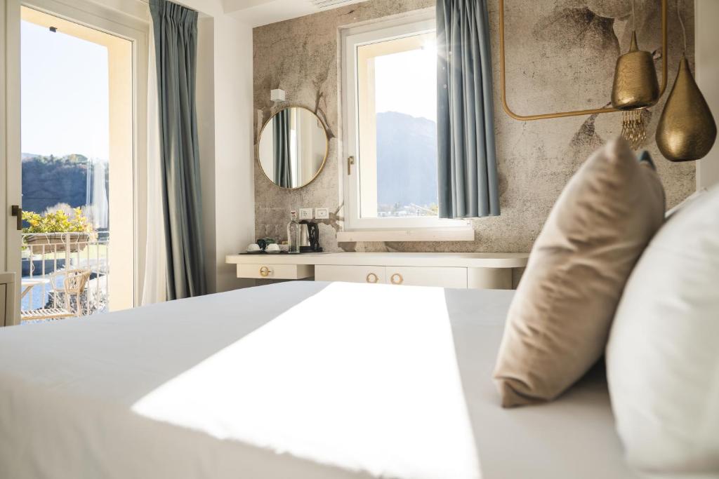 Posteľ alebo postele v izbe v ubytovaní LUXURY SUITES ROCOPOM - Lake Front