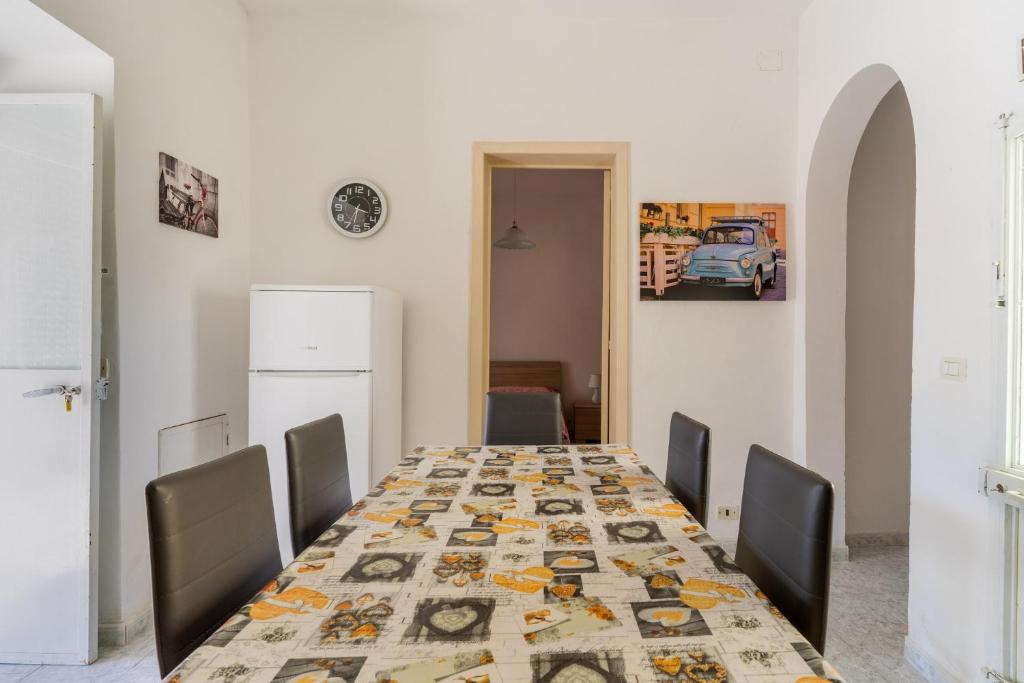 Łóżko lub łóżka w pokoju w obiekcie Casa Vacanze Salento