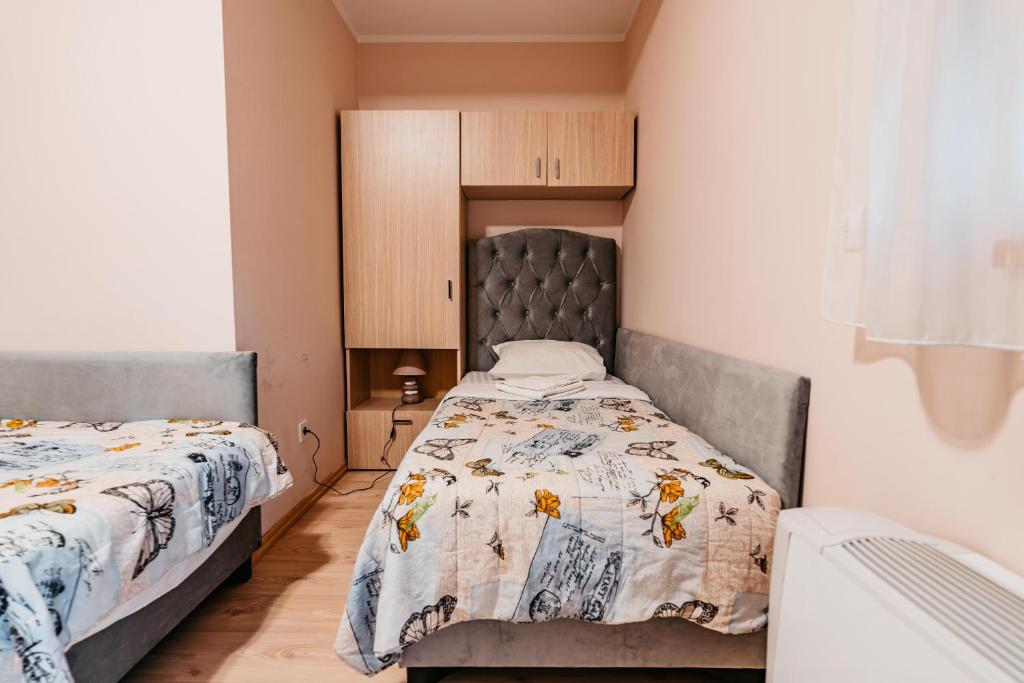 Postel nebo postele na pokoji v ubytování Lotos Depandans