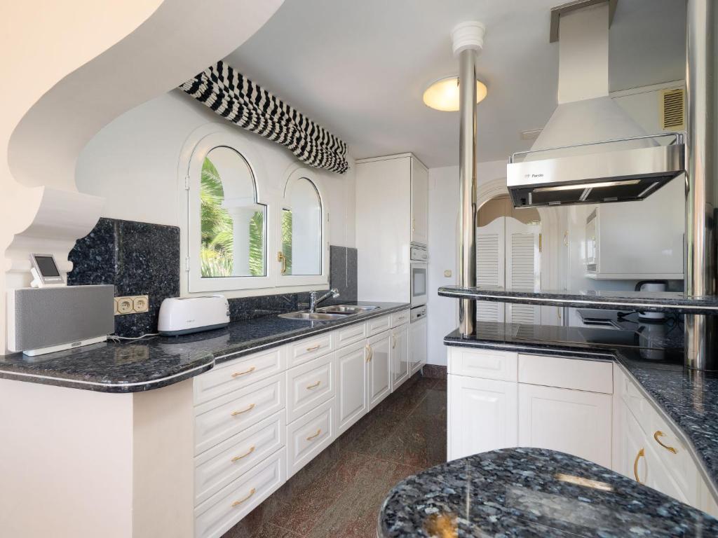 A kitchen or kitchenette at Villa Luxemburg by Interhome