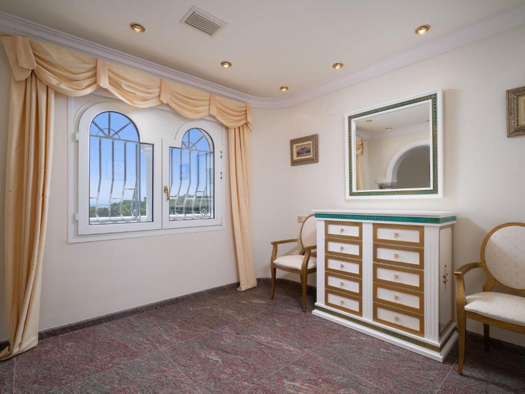 A television and/or entertainment centre at Villa Luxemburg by Interhome