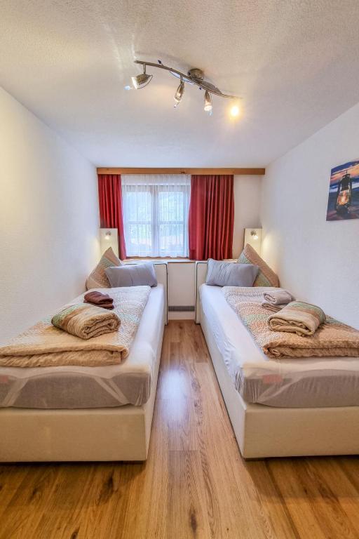 Posteľ alebo postele v izbe v ubytovaní Apartment Zipparashof by Interhome