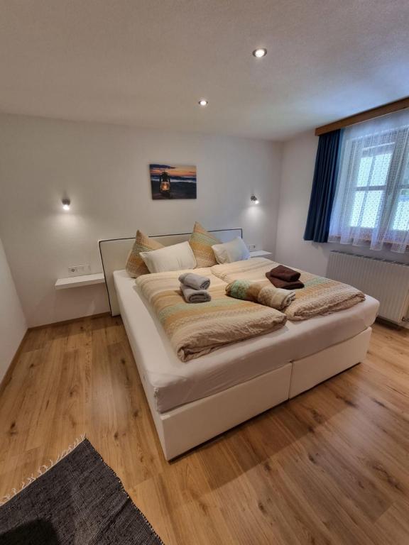 Posteľ alebo postele v izbe v ubytovaní Apartment Zipparashof by Interhome