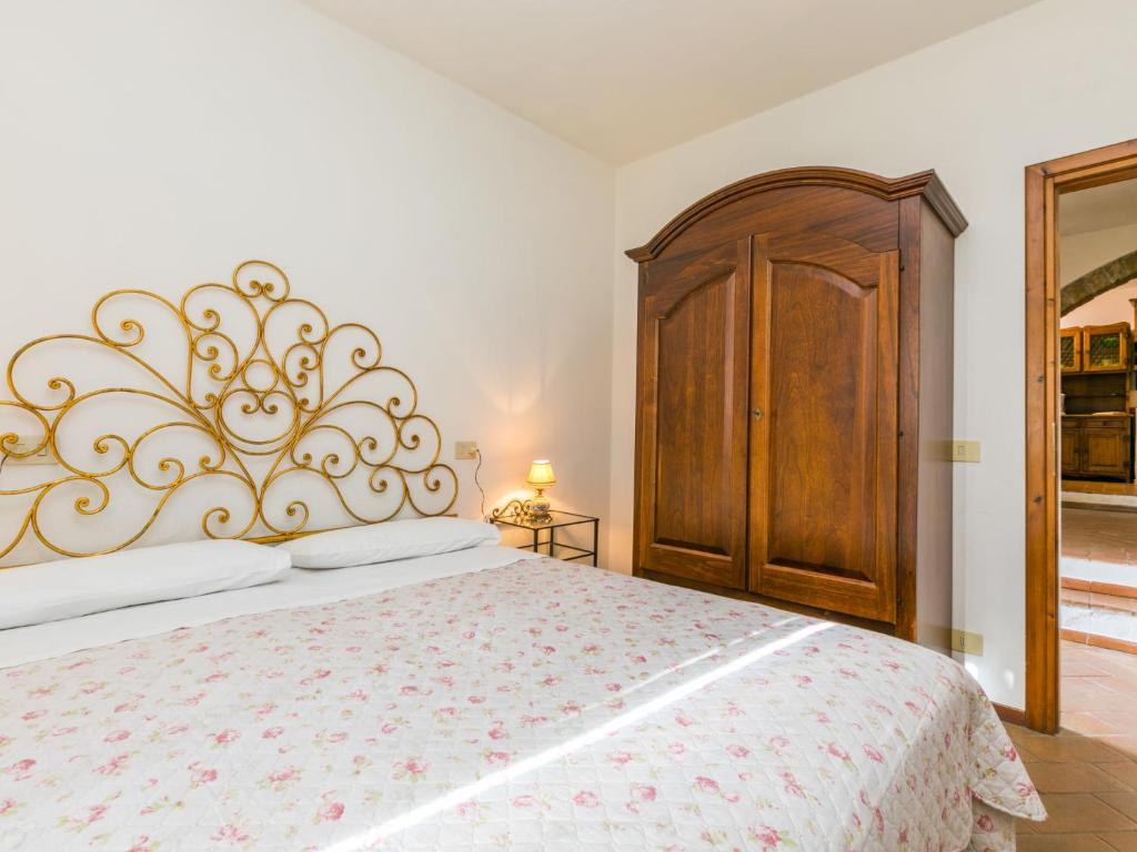 Łóżko lub łóżka w pokoju w obiekcie Holiday Home Appartamento Piccolo by Interhome