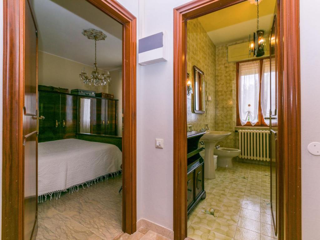 Łóżko lub łóżka w pokoju w obiekcie Holiday Home Miranda by Interhome