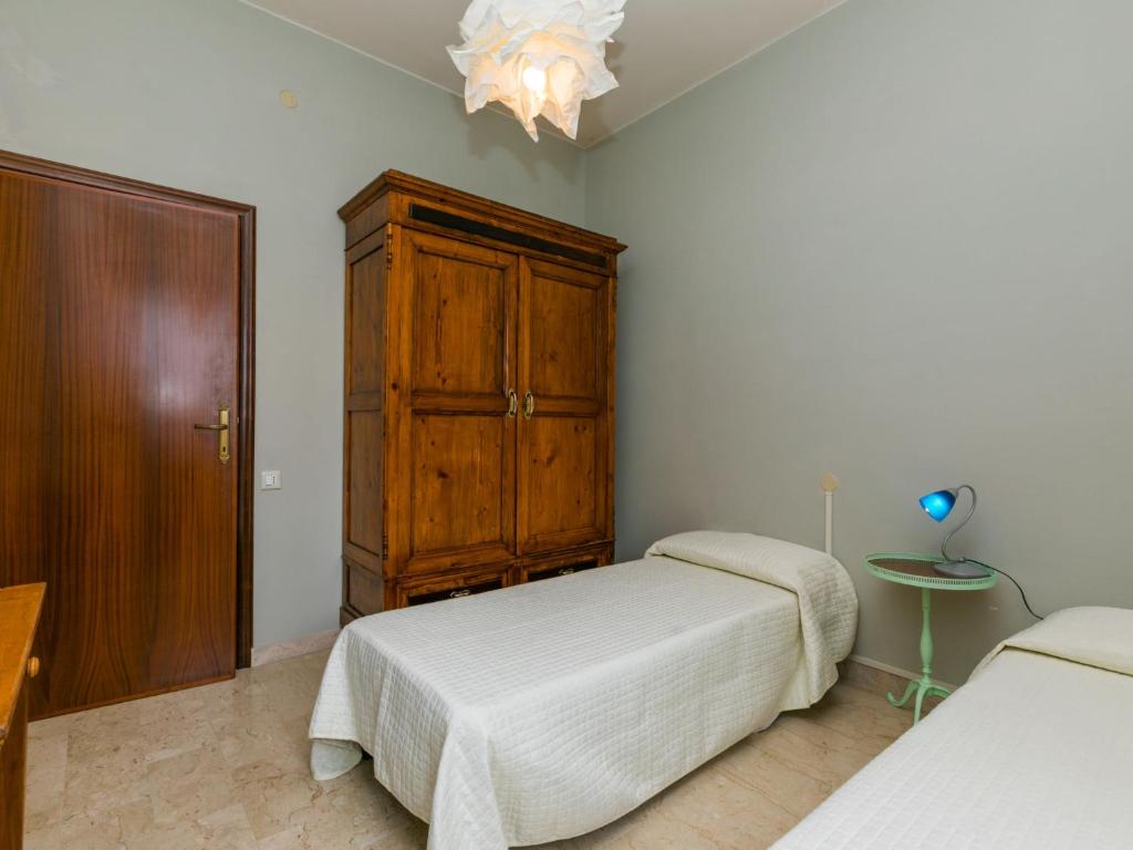 Łóżko lub łóżka w pokoju w obiekcie Holiday Home Miranda by Interhome
