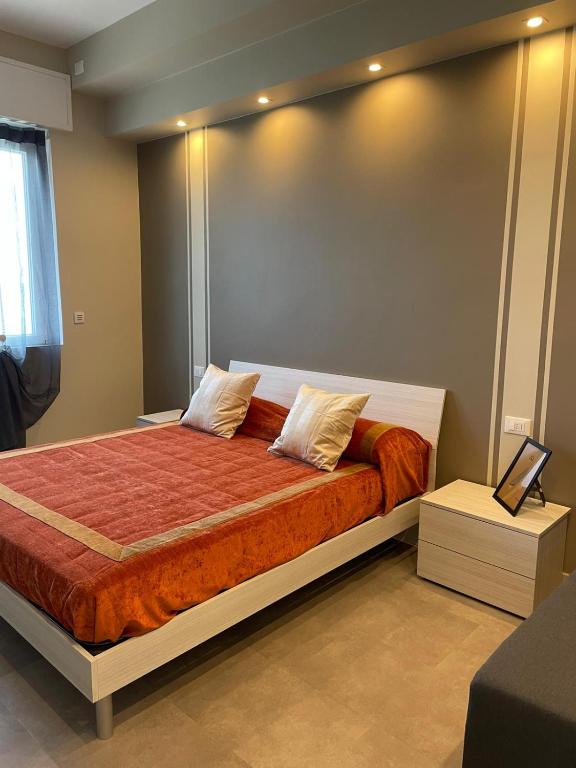 A bed or beds in a room at Au Mà