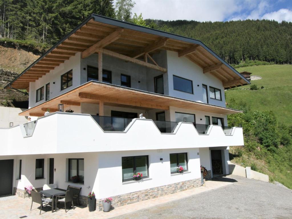 a house on the side of a mountain at Apartment Kirchler by Interhome in Hippach