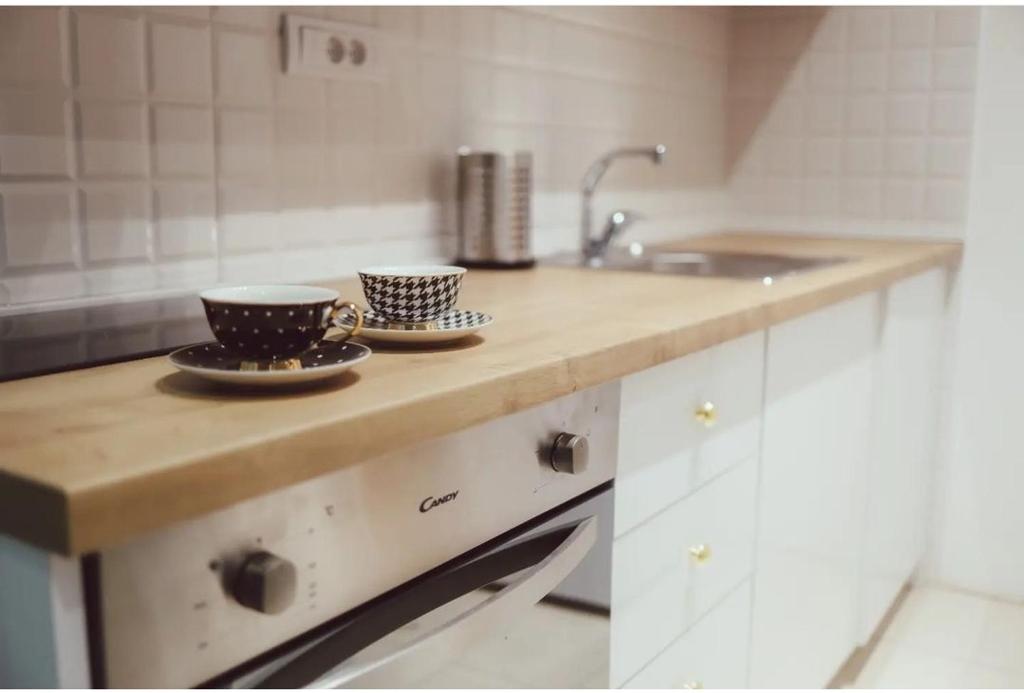 Eldhús eða eldhúskrókur á Apartmani Queen