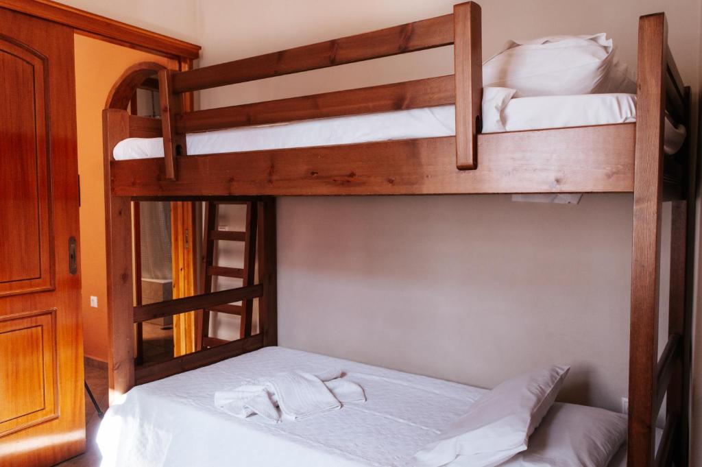A bed or beds in a room at Chaniotis Home, In the heart of Kinidaros