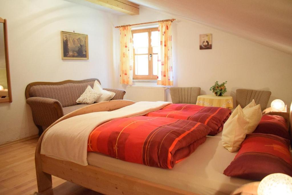 Postel nebo postele na pokoji v ubytování Ferienwohnung Geiger
