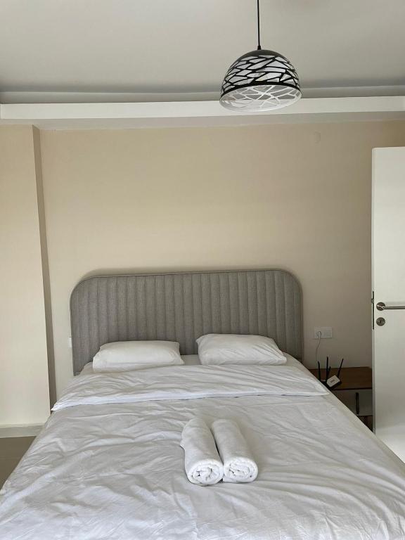 Postel nebo postele na pokoji v ubytování Belek Golf Village Apartments