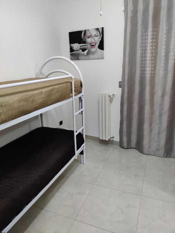 Postel nebo postele na pokoji v ubytování B&B Planet