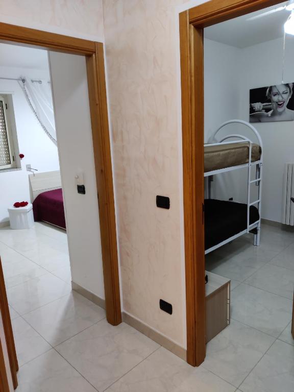 Postel nebo postele na pokoji v ubytování B&B Planet