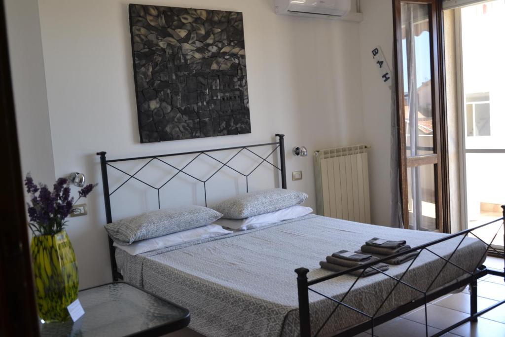 Postel nebo postele na pokoji v ubytování White Beach