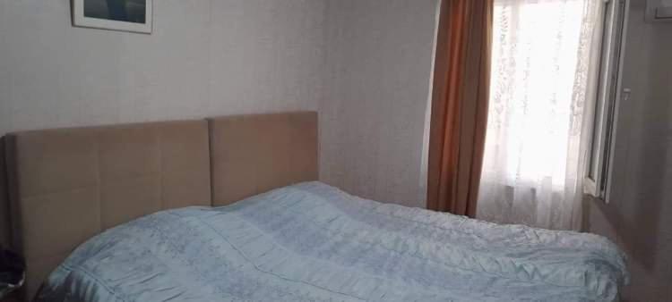 Postel nebo postele na pokoji v ubytování Tariel Guest House