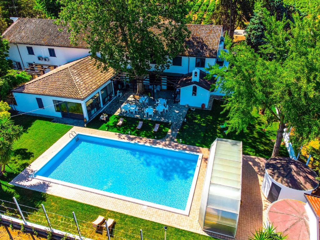 an overhead view of a swimming pool in a yard at Masseria Brica Rossa in Thurio