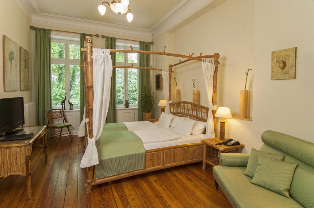 Un ou plusieurs lits dans un hébergement de l'établissement Hotel Miramar