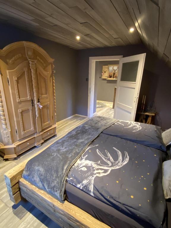 Voodi või voodid majutusasutuse Chalet am Weißenbach toas