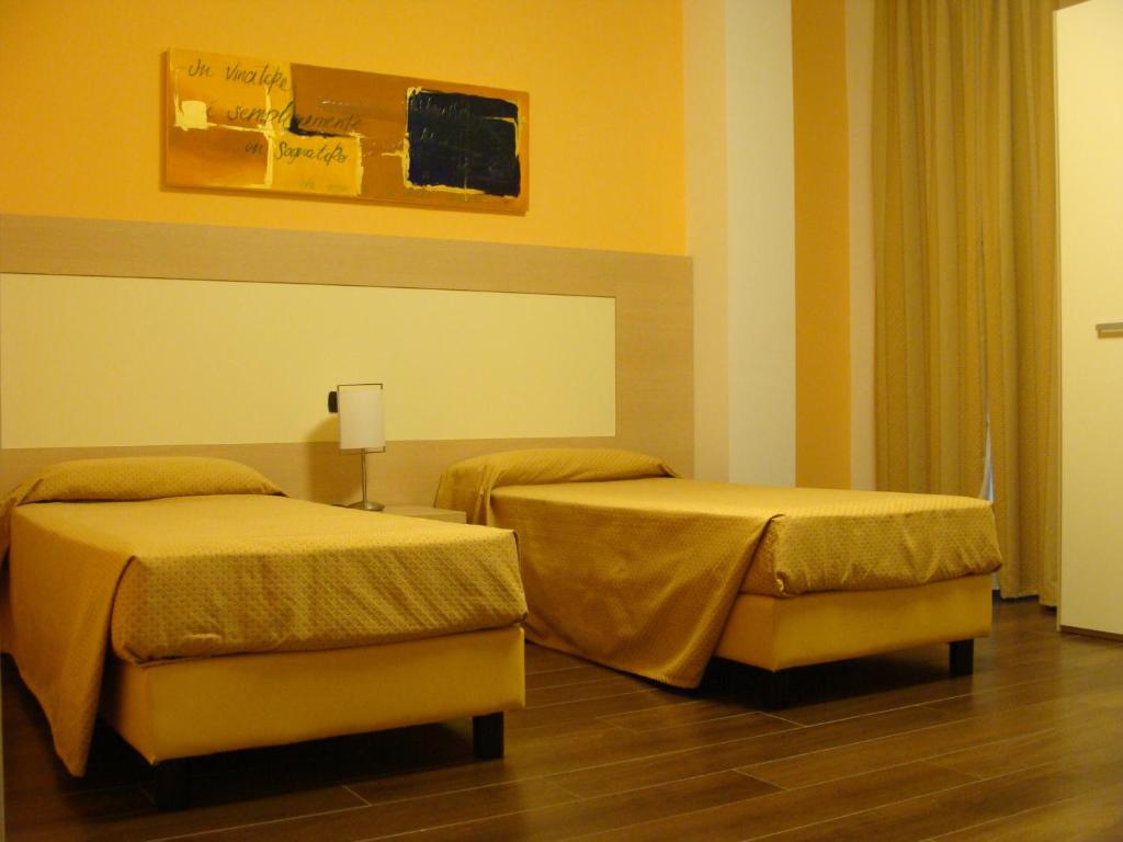 Postel nebo postele na pokoji v ubytování Groane Hotel Residence