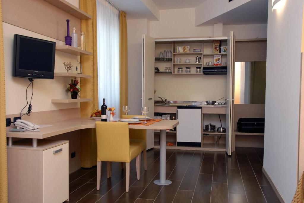 Kuchyň nebo kuchyňský kout v ubytování Groane Hotel Residence