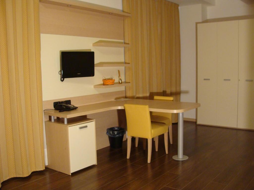 Kuchyň nebo kuchyňský kout v ubytování Groane Hotel Residence