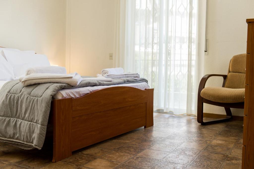 Postel nebo postele na pokoji v ubytování Villa LINDEN Kallikratia