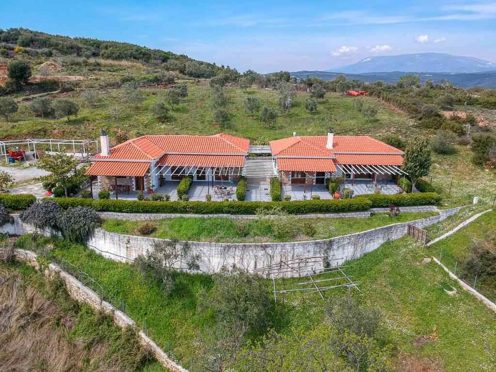 an aerial view of a house on a hill at Leonidas in Xinóvrisi