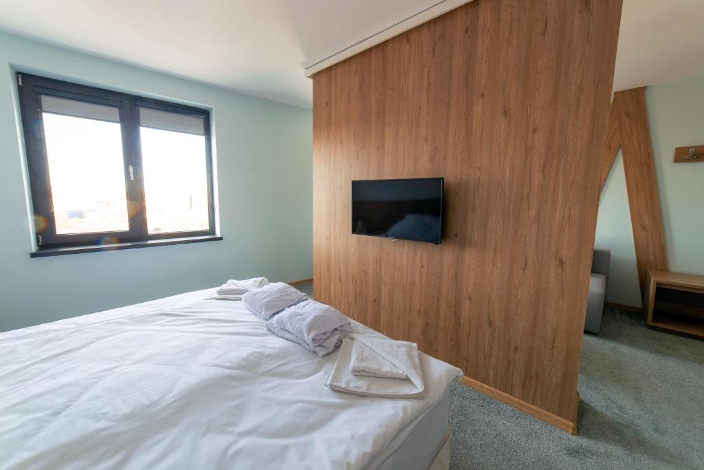 Postel nebo postele na pokoji v ubytování Hotel Verticalplus
