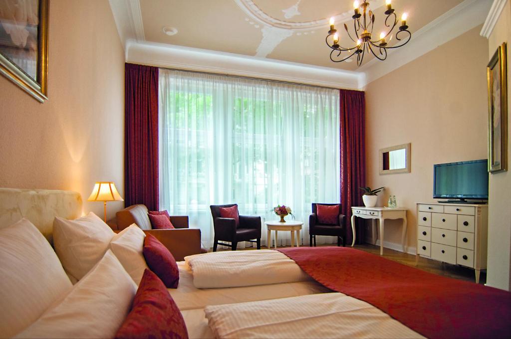 Televiisor ja/või meelelahutuskeskus majutusasutuses Hotel Mare