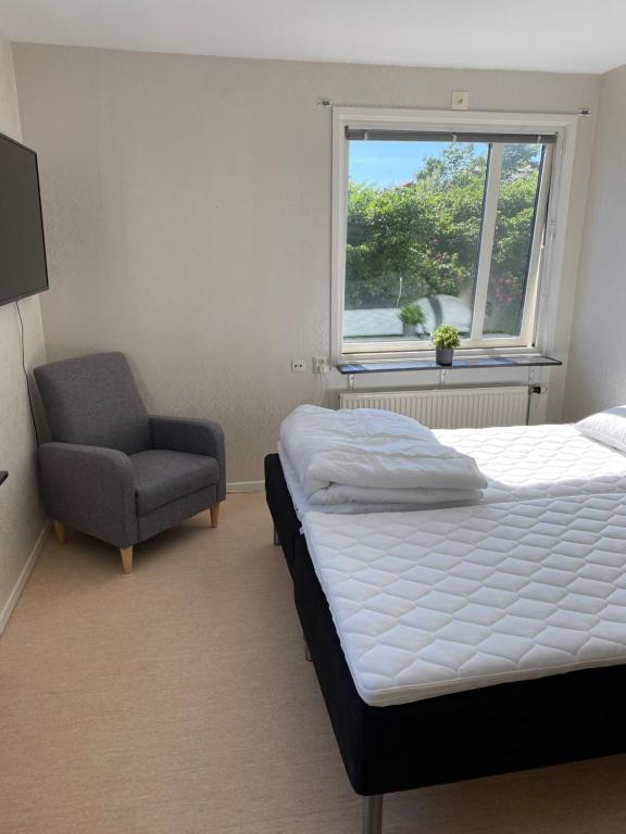 Postel nebo postele na pokoji v ubytování Workershotel Lysekil
