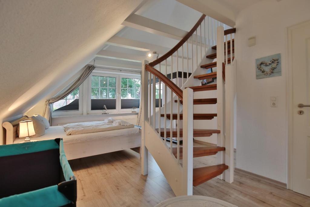 Postel nebo postele na pokoji v ubytování Strandhus Strandhus