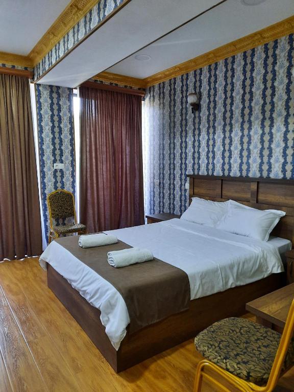 Postel nebo postele na pokoji v ubytování Hotel LU-MA