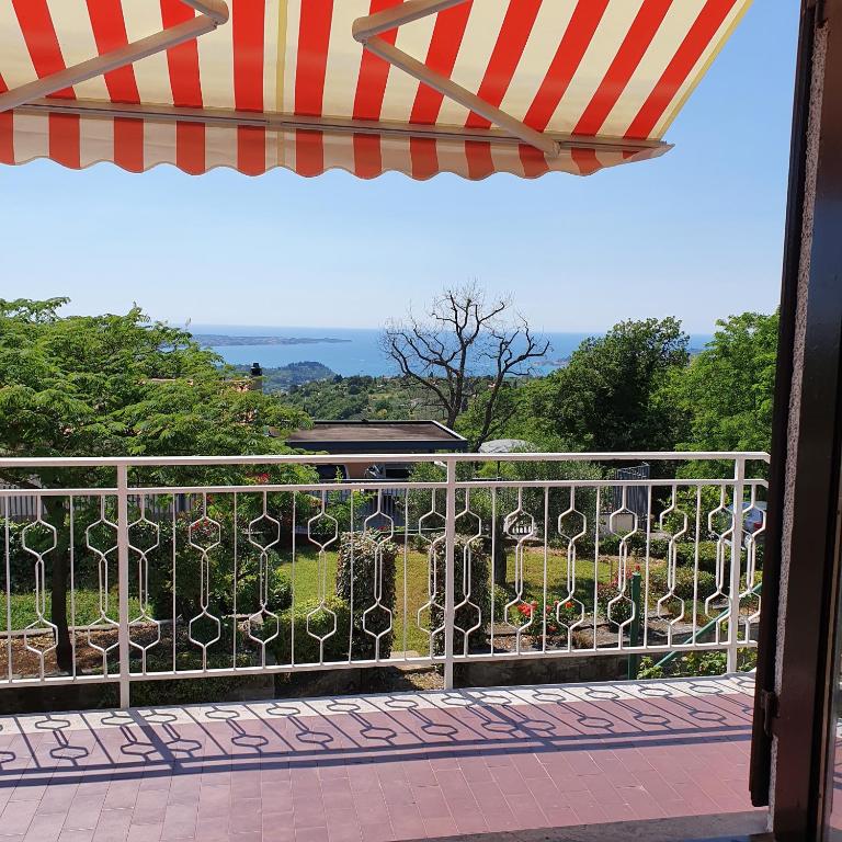 a balcony with a view of a garden at ★Apartment Stella★ in Malija