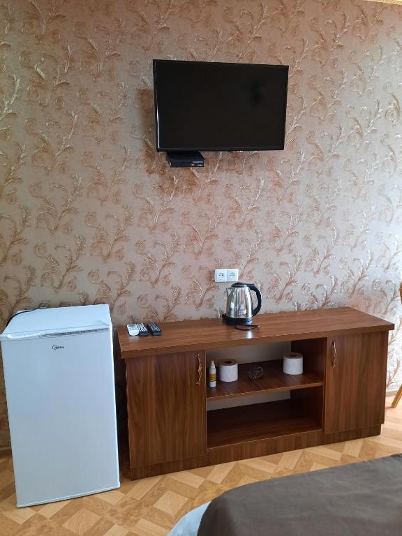 TV a/nebo společenská místnost v ubytování Hotel LU-MA