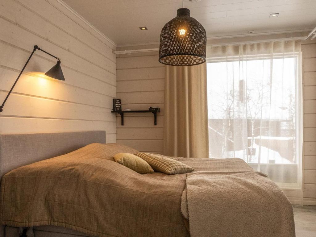 Postel nebo postele na pokoji v ubytování Holiday Home Haltinmalla by Interhome