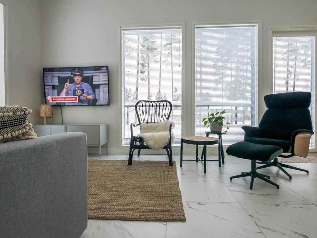 TV a/nebo společenská místnost v ubytování Holiday Home Villa kuortane by Interhome