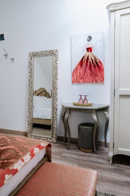 Un pat sau paturi într-o cameră la Casa Gallo