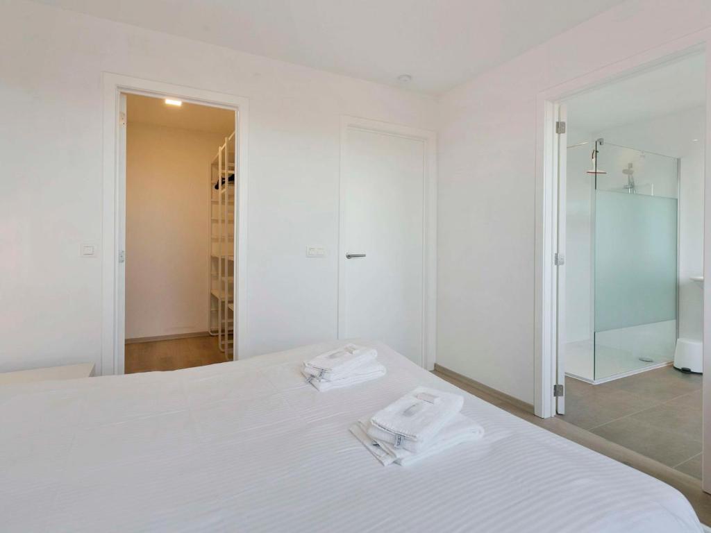 Postel nebo postele na pokoji v ubytování Apartment L'Espérance sur mer by Interhome