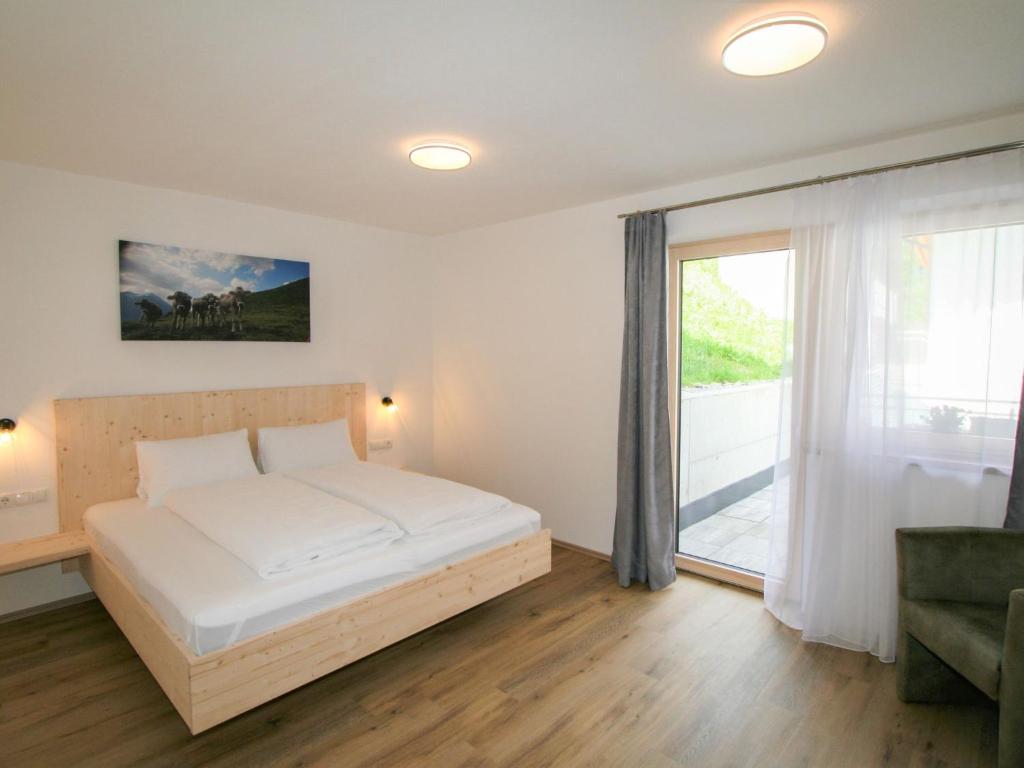 Postel nebo postele na pokoji v ubytování Apartment Rosina by Interhome
