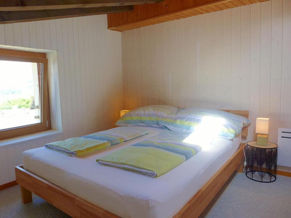 Postel nebo postele na pokoji v ubytování Apartment Tilleul by Interhome