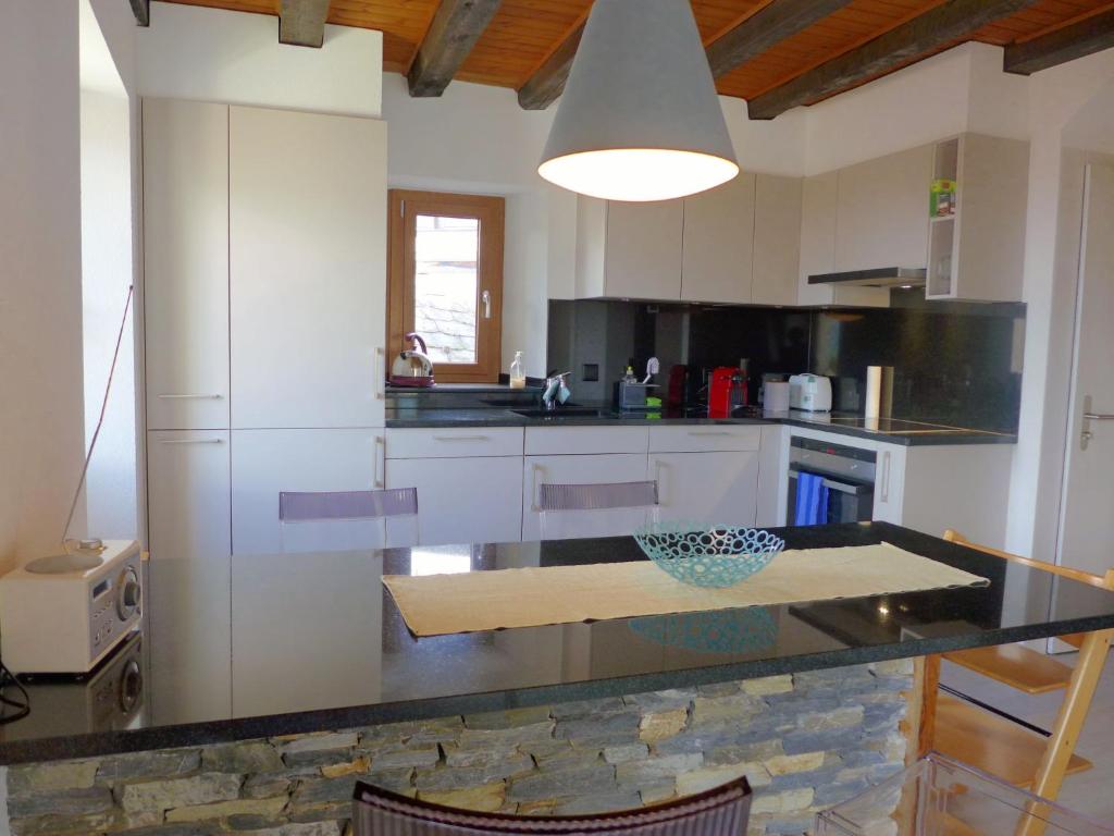 Kuchyň nebo kuchyňský kout v ubytování Apartment Tilleul by Interhome