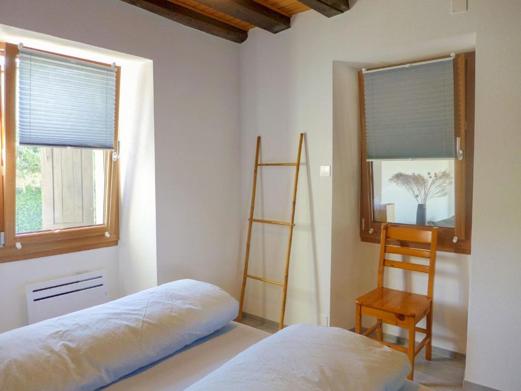 Postel nebo postele na pokoji v ubytování Apartment Tilleul by Interhome