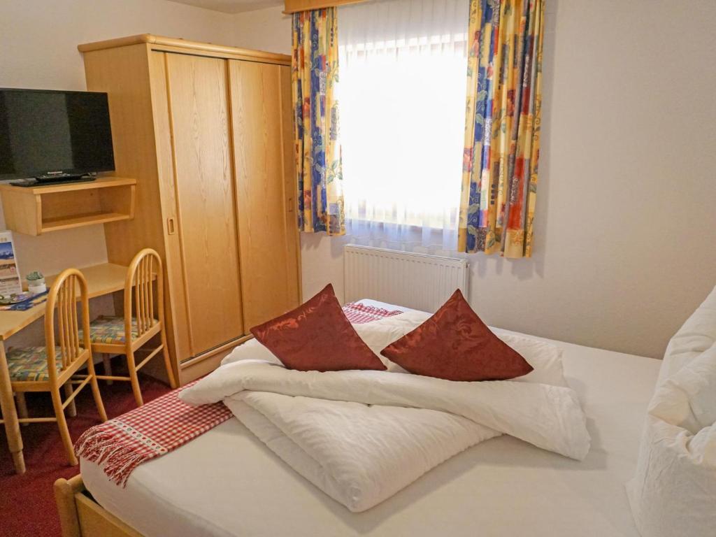 Posteľ alebo postele v izbe v ubytovaní Apartment Apart 107 Wiesenhof by Interhome