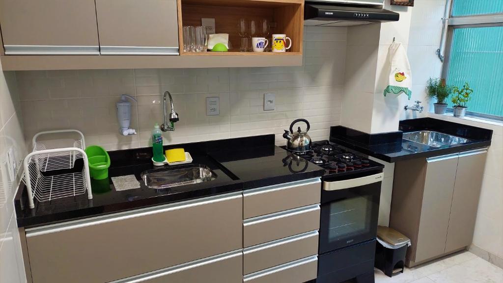Kuchyň nebo kuchyňský kout v ubytování Apartamento Top, 3 quartos, Wi-Fi 300 Mbps